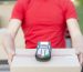 close-up-guy-holding-box-pos-machine